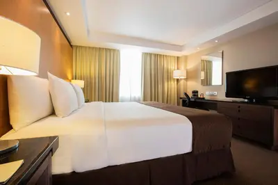 Cama o camas de una habitación en Krystal Urban Aeropuerto Ciudad de Mexico