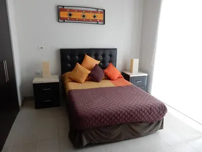 Cama o camas de una habitación en La Isla Gran Cayman 904