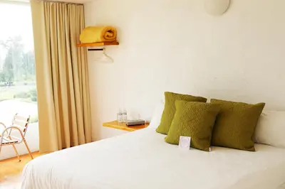 Cama o camas de una habitación en Hacienda Panoaya