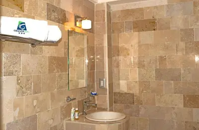 Un baño de Hotel Granda Inn