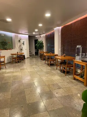 Un restaurante o sitio para comer en Hotel La Vista
