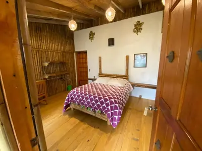 Cama o camas de una habitación en Cabañas Aldea San Francisco de Asís