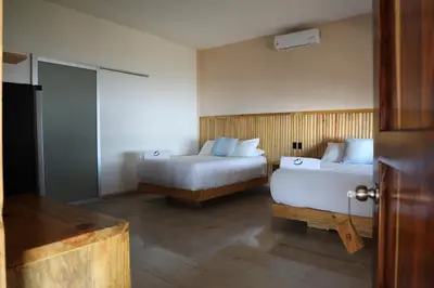 Cama o camas de una habitación en Hotel Playa Zipolite
