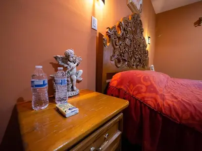 Cama o camas de una habitación en Hotel el Ángel Taxco