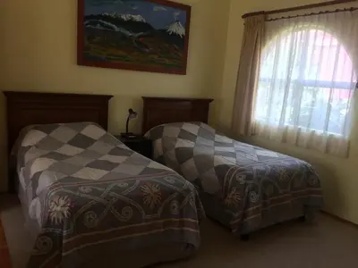 Cama o camas de una habitación en Villas Sol y Luna Coyoacan