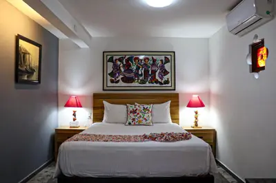 Cama o camas de una habitación en La Casita de Coyoacán