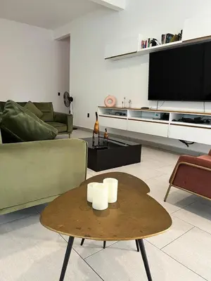 Una televisión o centro de entretenimiento en Rancho Macloy Hotel Spa & Social Events