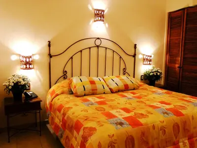 Cama o camas de una habitación en Hotel Dainzu