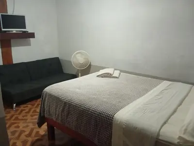Cama o camas de una habitación en Hospedaje San Antonio Tepoztlán.