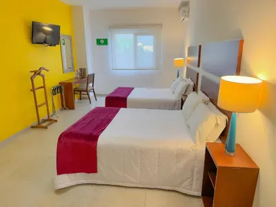 Cama o camas de una habitación en Casa de la iaia Hotel