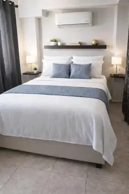 Cama o camas de una habitación en Loft Riviera Diamante