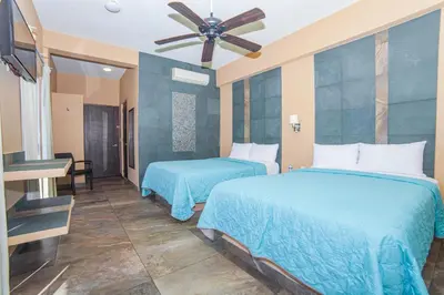 Cama o camas de una habitación en Hotel Nonni