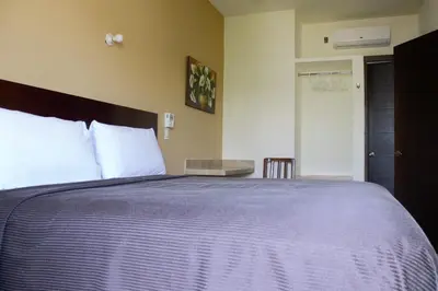 Cama o camas de una habitación en Hotel Nonni