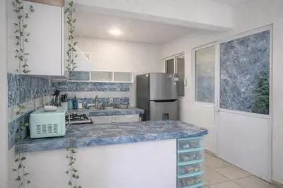 Una cocina o zona de cocina en Alexia Marina Diamante