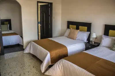 Cama o camas de una habitación en Múcara hotel