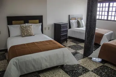 Cama o camas de una habitación en Múcara hotel