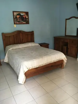 Cama o camas de una habitación en Hotel Posada Andaluz