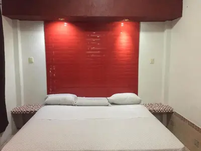 Cama o camas de una habitación en Hotel Paraiso Express