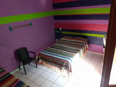 Cama o camas de una habitación en Iguana Hostel Oaxaca