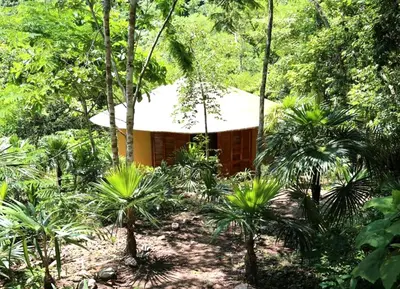 Jardín al aire libre en cabañas Camino Mágico