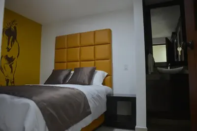 Cama o camas de una habitación en Andrea´s Hotel Boutique