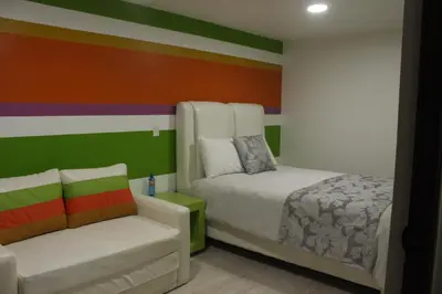 Cama o camas de una habitación en Andrea´s Hotel Boutique