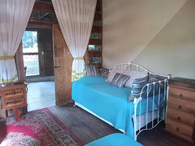 Cama o camas de una habitación en La Troje Cabañas