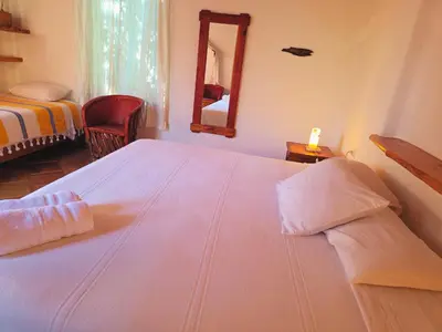 Cama o camas de una habitación en Cabañas el Nido de la Huilota