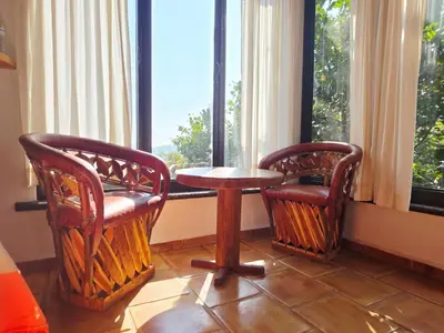 Zona de estar de Cabañas el Nido de la Huilota