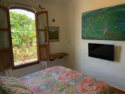 Una televisión o centro de entretenimiento en Casa Miguel Arcangel
