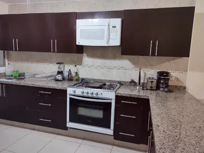Una cocina o zona de cocina en Villa Perfecta Zona Diamante