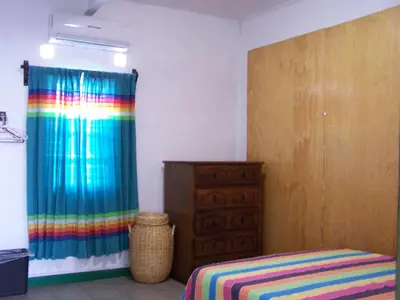 Cama o camas de una habitación en Hostal Mixteco Naba Nandoo