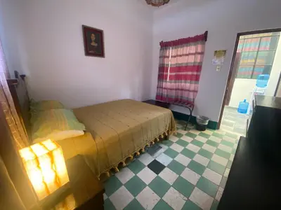 Cama o camas de una habitación en Hostal Mixteco Naba Nandoo
