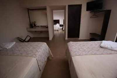Cama o camas de una habitación en Hotel Sacre