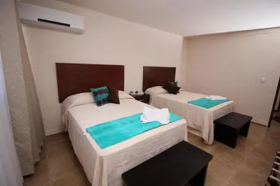 Cama o camas de una habitación en Hotel Sacre