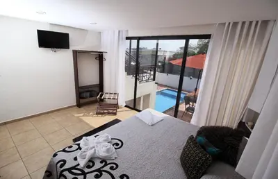 Cama o camas de una habitación en Hotel Sacre