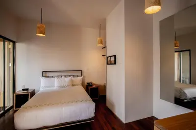 Cama o camas de una habitación en Hotel Los Amantes