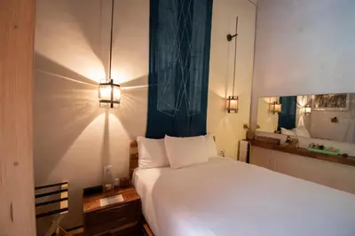 Cama o camas de una habitación en Hotel Los Amantes