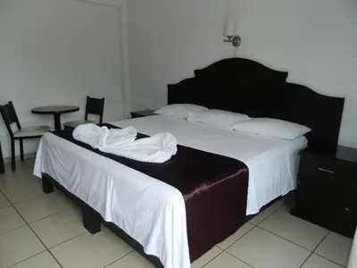 Cama o camas de una habitación en Hotel Terrazas Inn