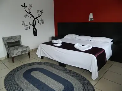 Cama o camas de una habitación en Hotel Terrazas Inn