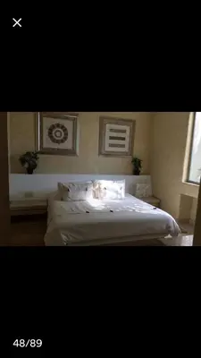 Cama o camas de una habitación en Oceanfront Apartment at Punta Diamante