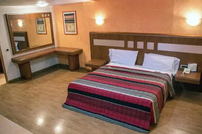 Cama o camas de una habitación en Autohotel Ilussion