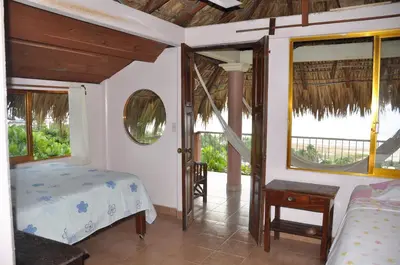 Cama o camas de una habitación en Ananda Guest House Yoga & Meditación