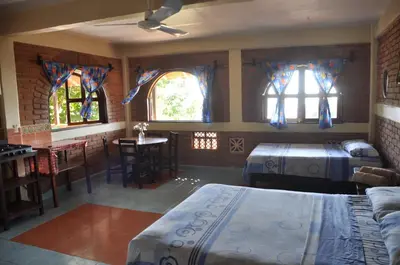 Cama o camas de una habitación en Ananda Guest House Yoga & Meditación
