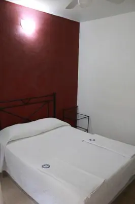 Cama o camas de una habitación en Hotel Casablanca Tuxtla