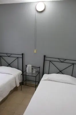 Cama o camas de una habitación en Hotel Casablanca Tuxtla