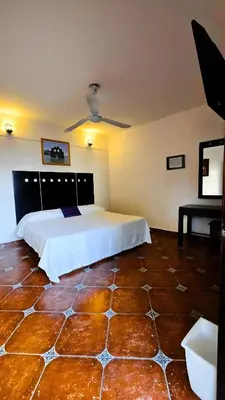 Cama o camas de una habitación en Hotel Villa Esmeralda