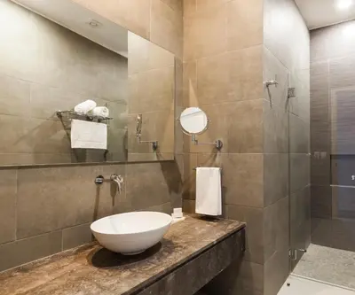Un baño de Real 1900