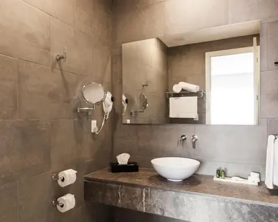 Un baño de Real 1900