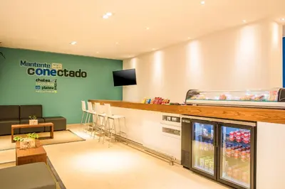 Una televisión o centro de entretenimiento en One Puebla Serdan